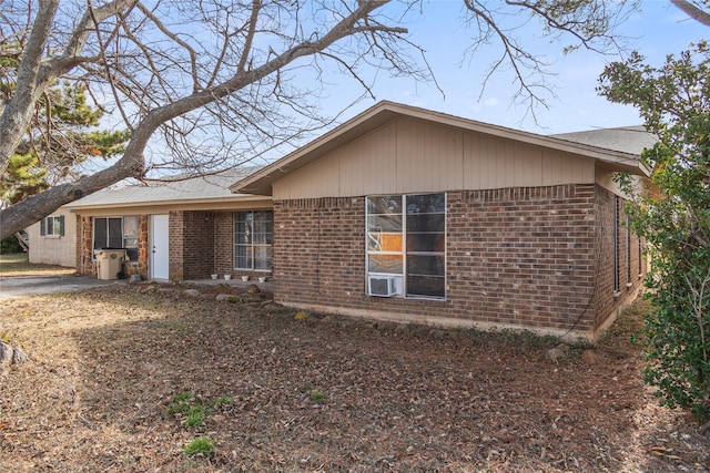 view of front of home featuring cooling unit