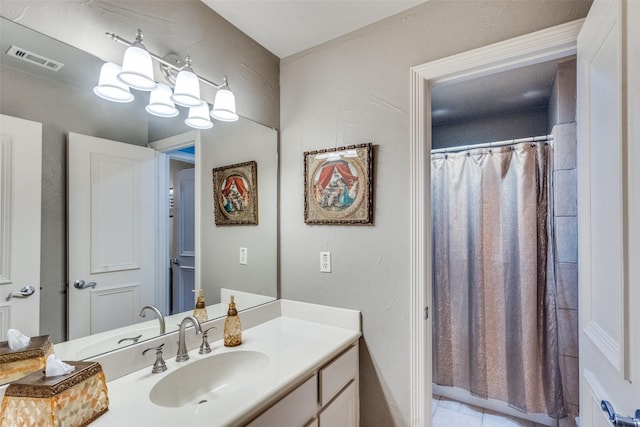 bathroom featuring vanity and a shower with curtain