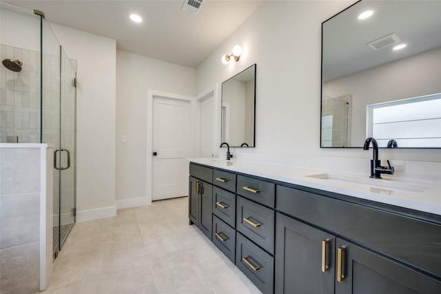 bathroom featuring vanity and a shower with shower door