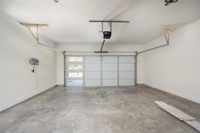 garage featuring a garage door opener