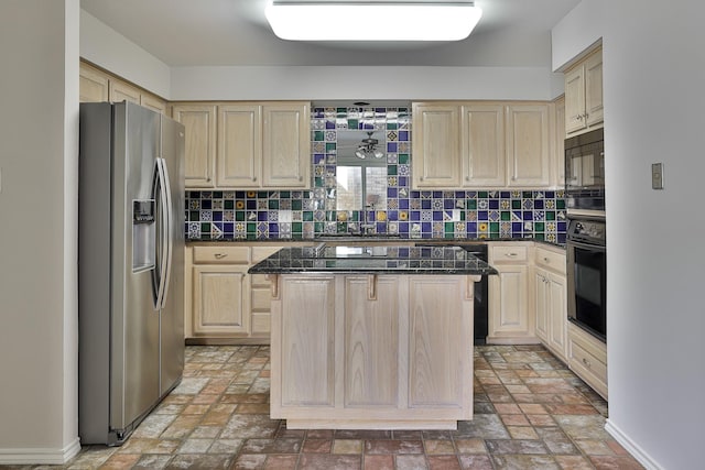 kitchen featuring black appliances, a center island, decorative backsplash, and light brown cabinets