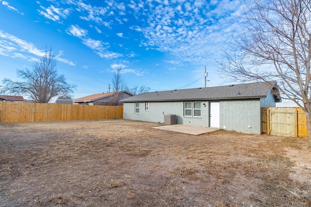 back of house featuring a patio area and central AC unit