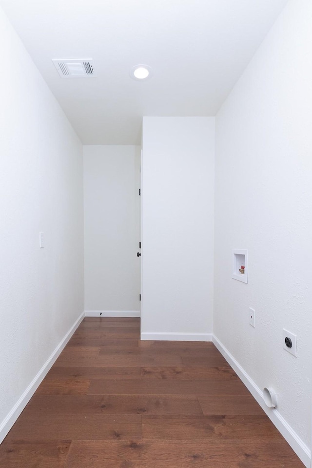 clothes washing area featuring washer hookup, dark hardwood / wood-style floors, and hookup for an electric dryer