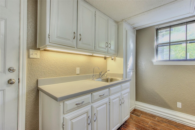 kitchen with white cabinets and sink