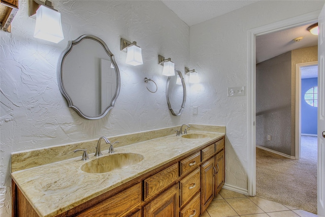 bathroom featuring tile patterned floors and vanity