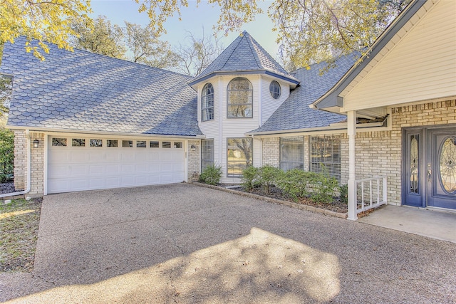 view of front of home with a garage