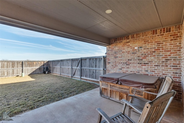 view of patio / terrace featuring a hot tub