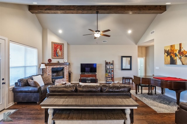 living room with high vaulted ceiling, dark hardwood / wood-style flooring, a fireplace, and ceiling fan