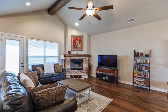 living room featuring beamed ceiling, ceiling fan, dark hardwood / wood-style flooring, high vaulted ceiling, and a fireplace