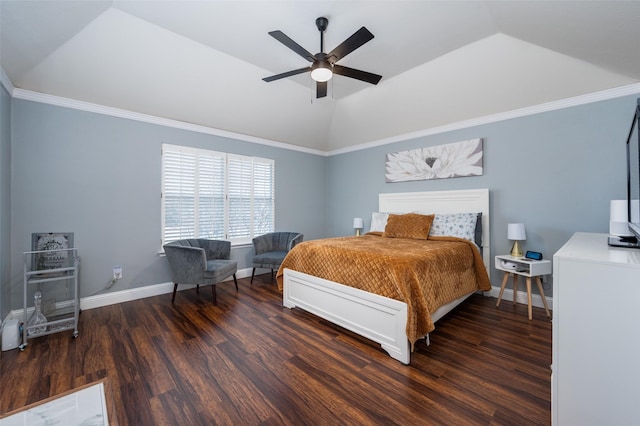 bedroom featuring vaulted ceiling, a raised ceiling, ceiling fan, ornamental molding, and dark hardwood / wood-style flooring