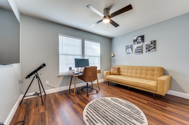 office space with ceiling fan and dark wood-type flooring