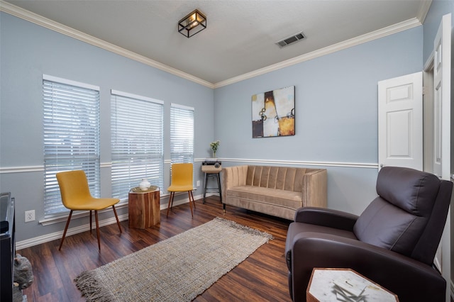 living area featuring dark hardwood / wood-style flooring and crown molding