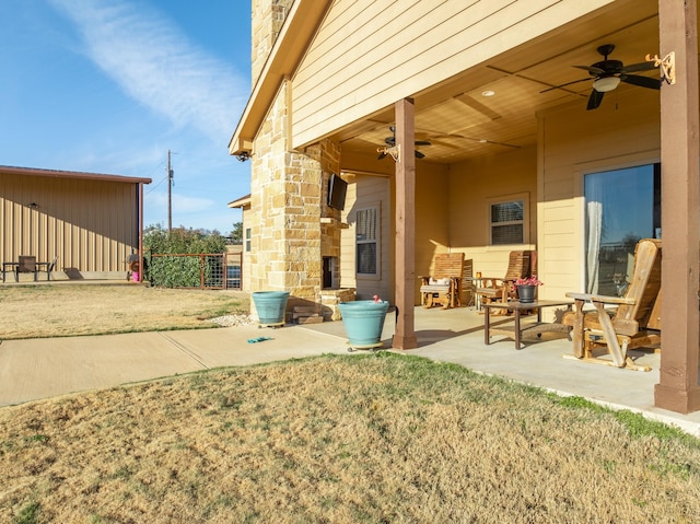 view of patio / terrace featuring ceiling fan