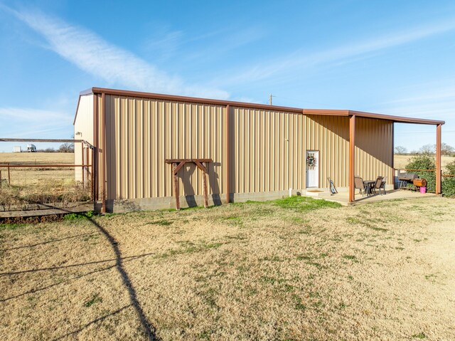 garage with a lawn