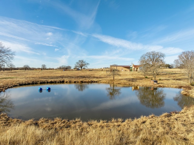 view of water feature with a rural view