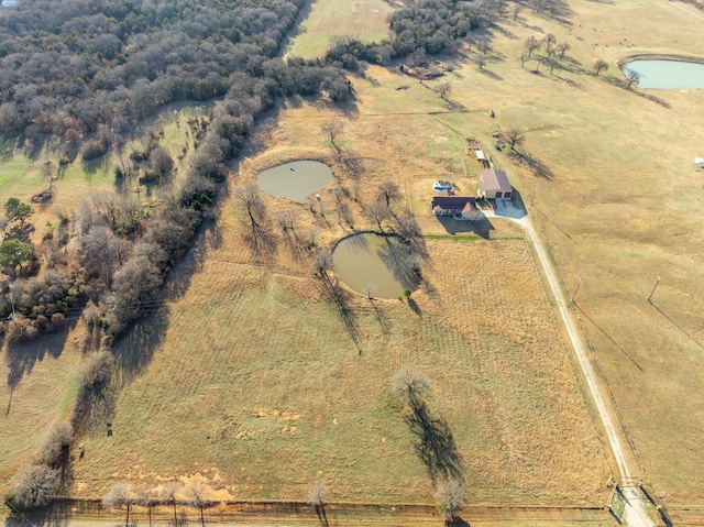 aerial view featuring a water view and a rural view