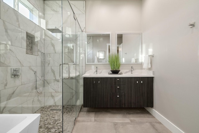 bathroom featuring shower with separate bathtub and vanity