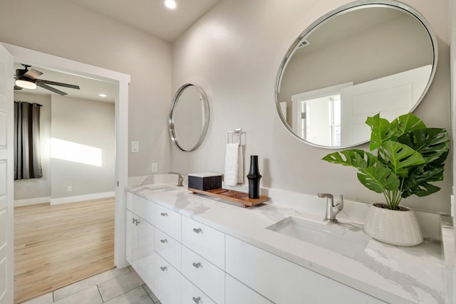 bathroom with vanity, tile patterned floors, and ceiling fan