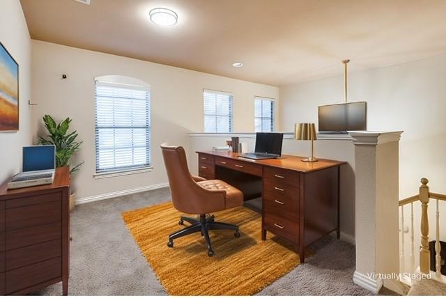 view of carpeted office space