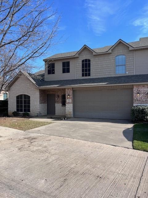 view of front property with a garage