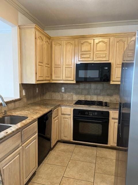 kitchen featuring light brown cabinets, ornamental molding, black appliances, and light tile patterned floors