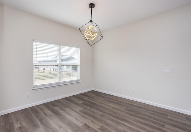 unfurnished room featuring dark hardwood / wood-style floors