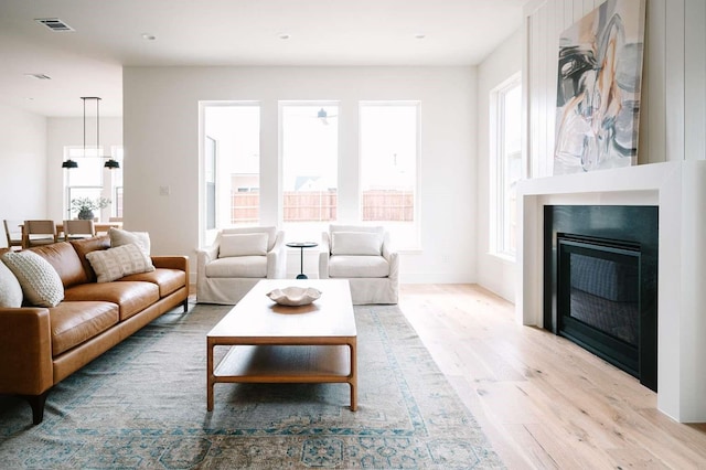 living room featuring light wood-type flooring