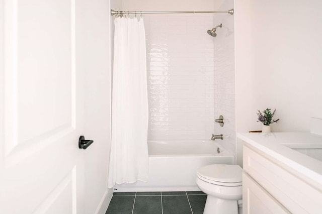 full bathroom with vanity, shower / bath combination with curtain, tile patterned floors, and toilet