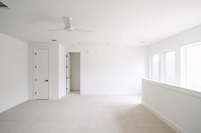 carpeted empty room with ceiling fan