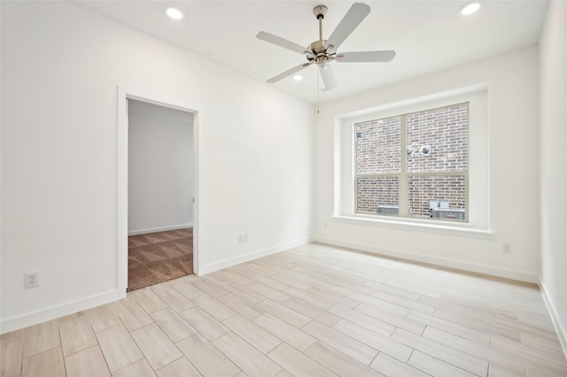 spare room featuring ceiling fan