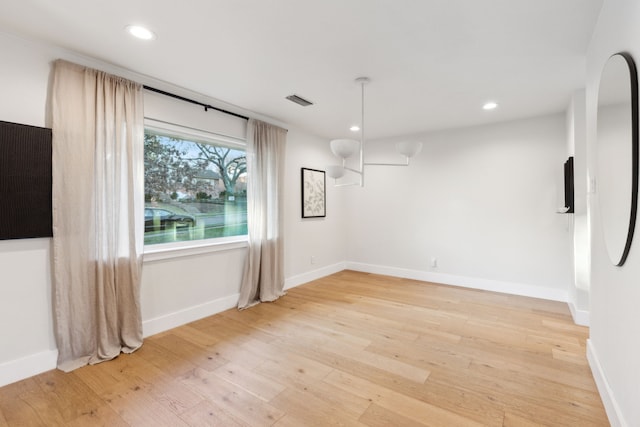 unfurnished dining area with hardwood / wood-style flooring