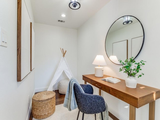 office area with hardwood / wood-style floors