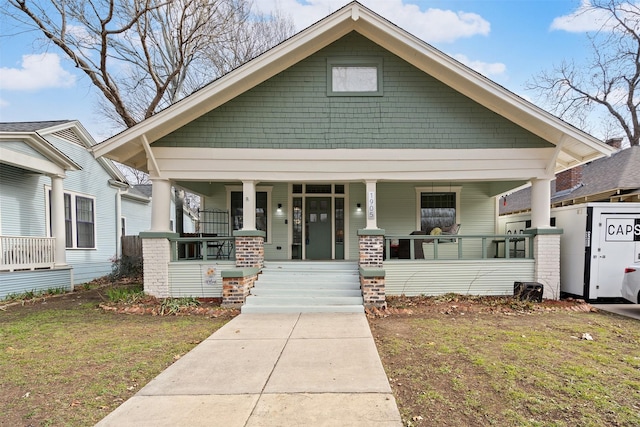 bungalow featuring covered porch