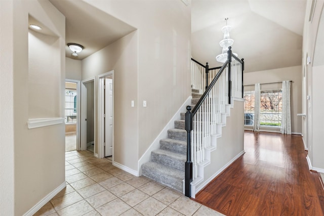 stairs with tile patterned flooring and plenty of natural light