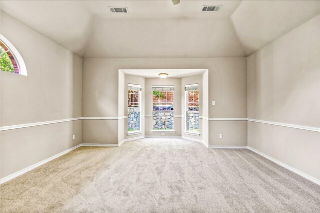 entrance foyer with high vaulted ceiling, light tile patterned floors, and a chandelier