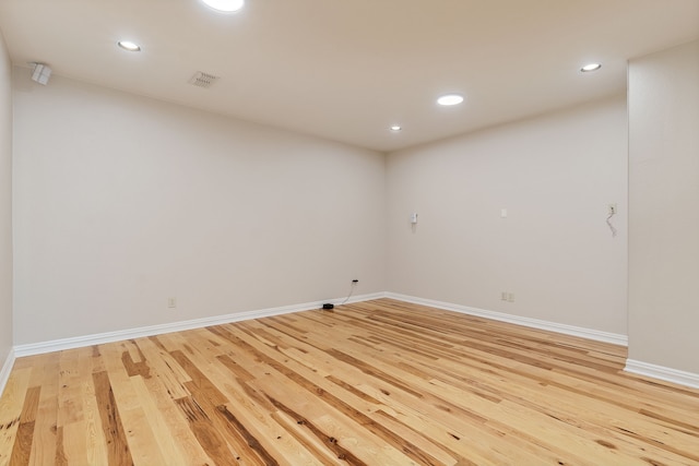 empty room featuring hardwood / wood-style flooring