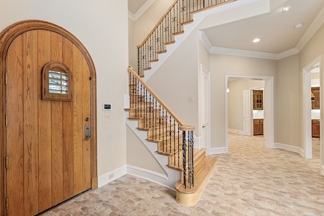 foyer entrance with ornamental molding