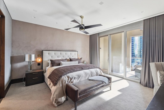 bedroom featuring ceiling fan, light colored carpet, and access to outside