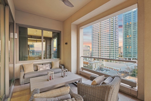 balcony at dusk with ceiling fan