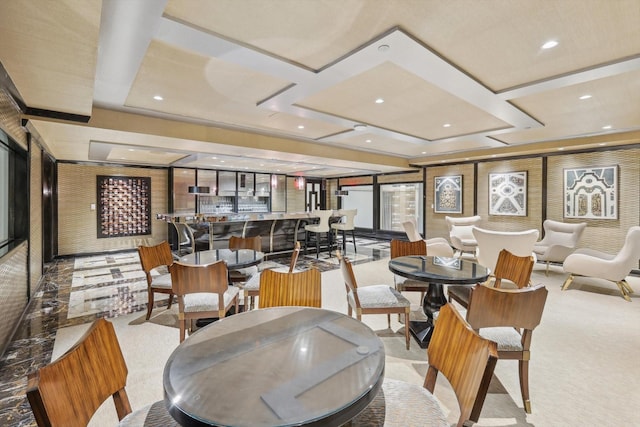 dining room with light colored carpet