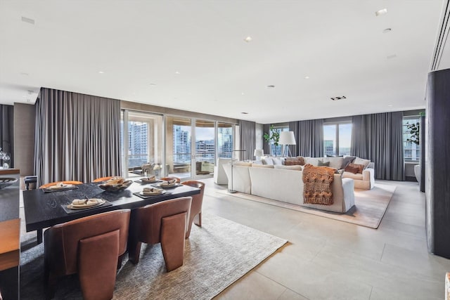 dining room featuring a wealth of natural light and floor to ceiling windows