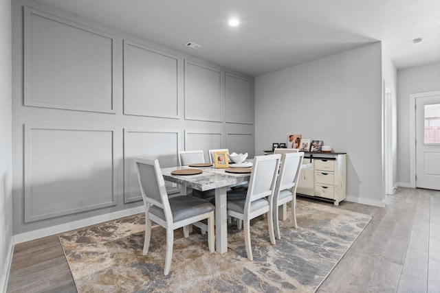 dining room featuring light wood-type flooring