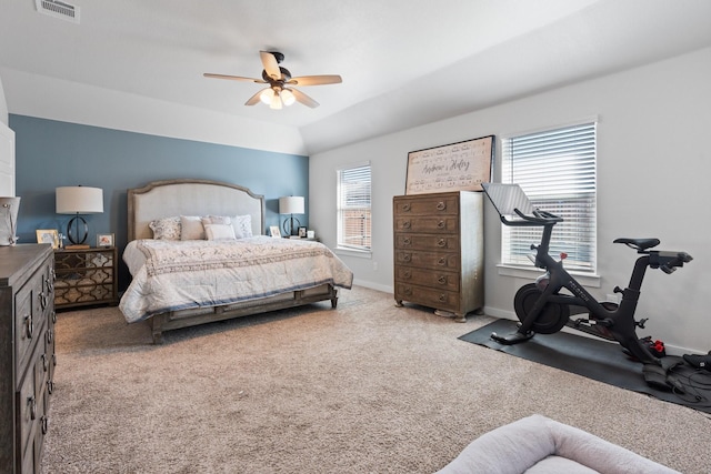 carpeted bedroom with lofted ceiling and ceiling fan