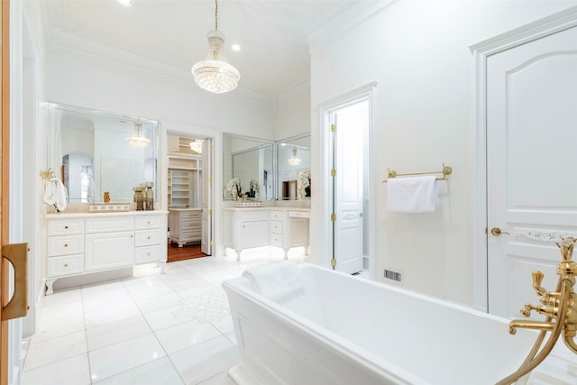 bathroom featuring a tub to relax in, vanity, tile patterned flooring, and ornamental molding