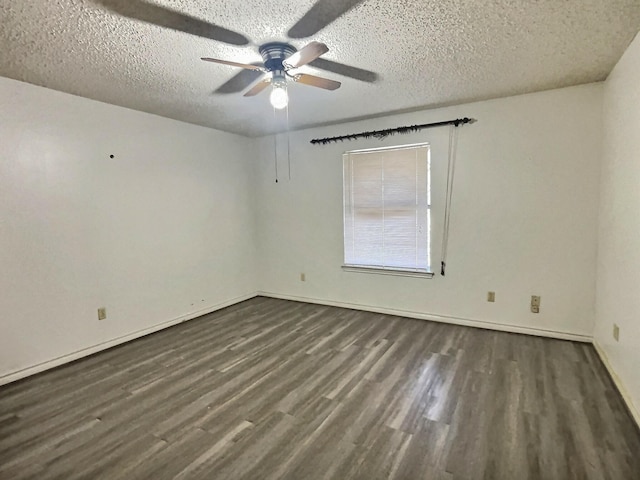 unfurnished room featuring a textured ceiling, ceiling fan, and dark hardwood / wood-style floors