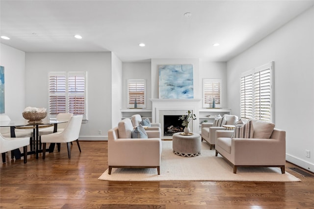 living room featuring dark hardwood / wood-style flooring