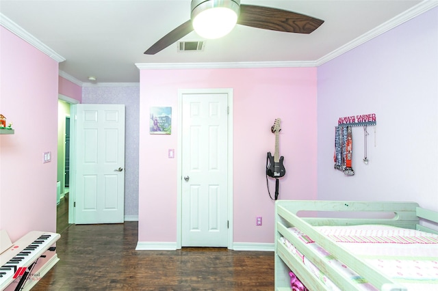 bedroom featuring visible vents, ceiling fan, baseboards, ornamental molding, and wood finished floors