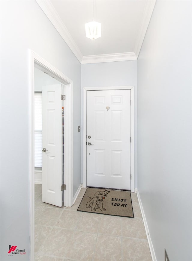 doorway to outside featuring tile patterned flooring, baseboards, and ornamental molding