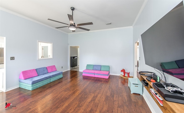 living room featuring ornamental molding, ceiling fan, and dark hardwood / wood-style floors