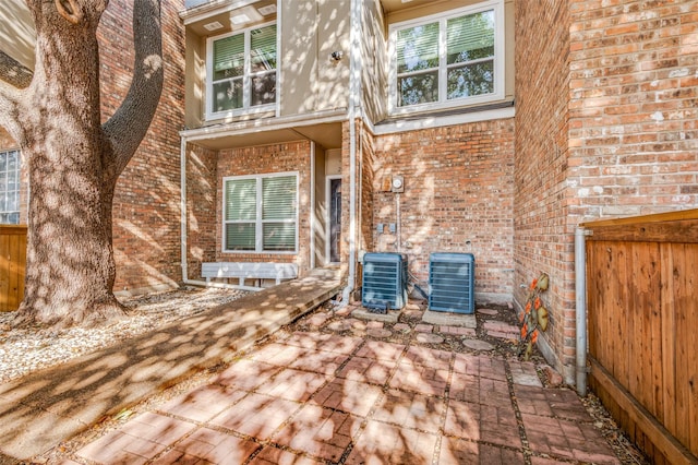 exterior space featuring central AC unit